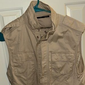 tan shirt with sleeve cut out (fits like medium)